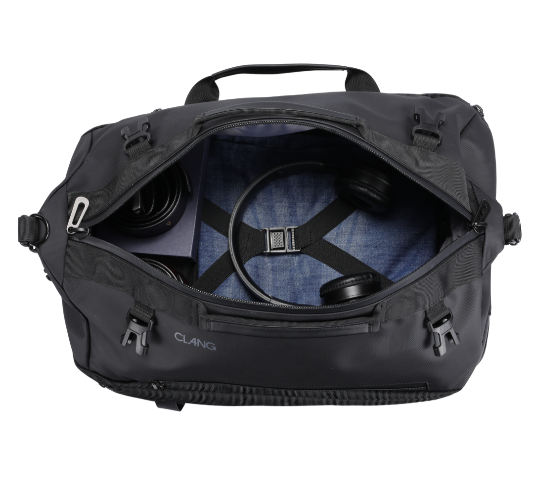 Black duffel bag with interior compartments on a white background