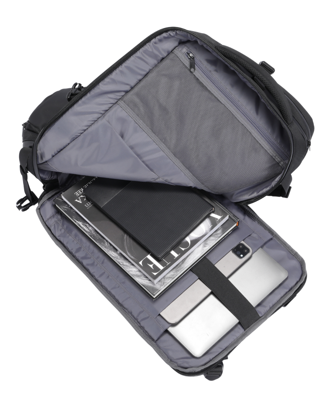 Open travel bag with compartments for electronic devices on a white background